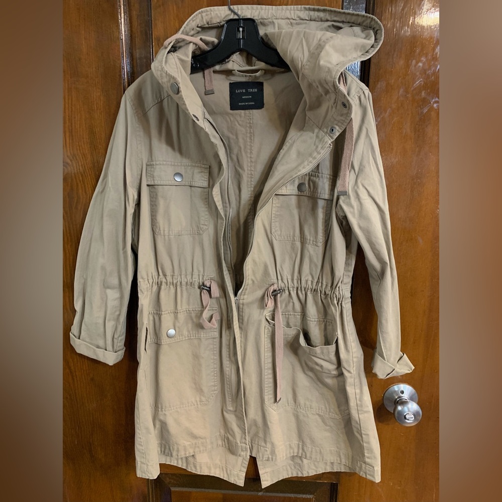 Tan jacket with zippers and buttons size medium